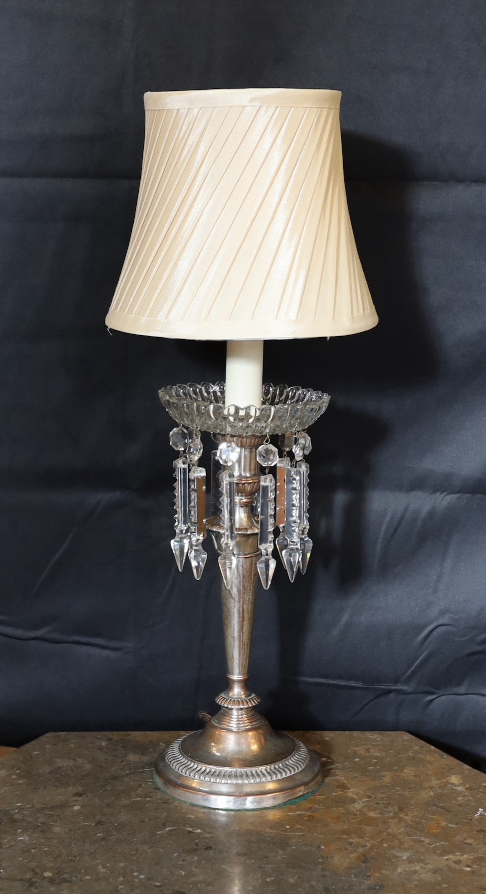 A pair of old Sheffield plate table lamps with moulded and cut glass lustre drops, height 44cm